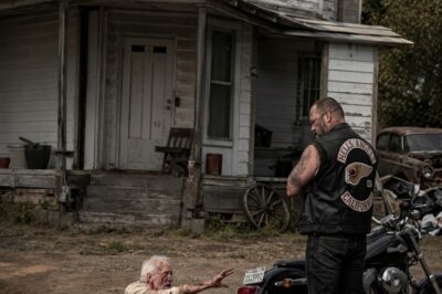 Elderly Man Crawled to the Road to Stop a Biker—What He Had Around His Neck Left Everyone Speechless