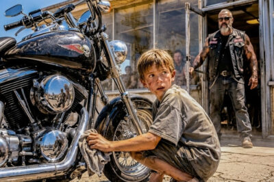 A Hungry Boy Cleaned a Biker’s Harley for $1 — Next Day, 140 Hells Angels Surprised Him