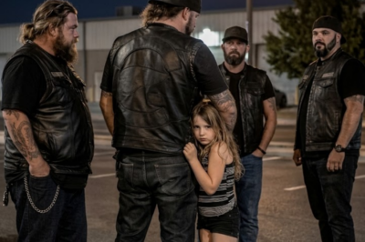 A 6-year-old girl grabbed a biker’s leather vest and wouldn’t let go. He tried to step away. She just held tighter. Then 250 motorcycles pulled into the parking lot. Every engine went silent. Every eye turned to her. And the scariest-looking men in California became her shield.
