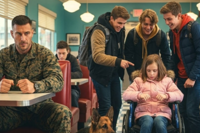 Rich kids in a diner were mocking a little girl in a wheelchair. Nobody said a word. Nobody moved. Then a German Shepherd quietly stood up — and placed himself between her and them. No bark. No growl. Just… stood there. The whole diner went silent. That was the miracle.