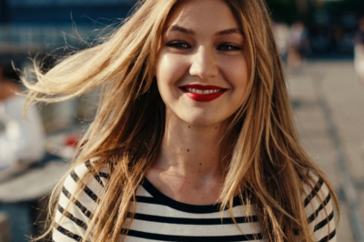 She was born with a name that opens every door, $30M, and a runway at 2 years old… but then came the Buddha cookie, the Cayman Islands arrest, and a $40M lawsuit over a voice she never owned. Gigi Hadid learned the hard way: privilege doesn’t protect you—it just makes the fall louder.